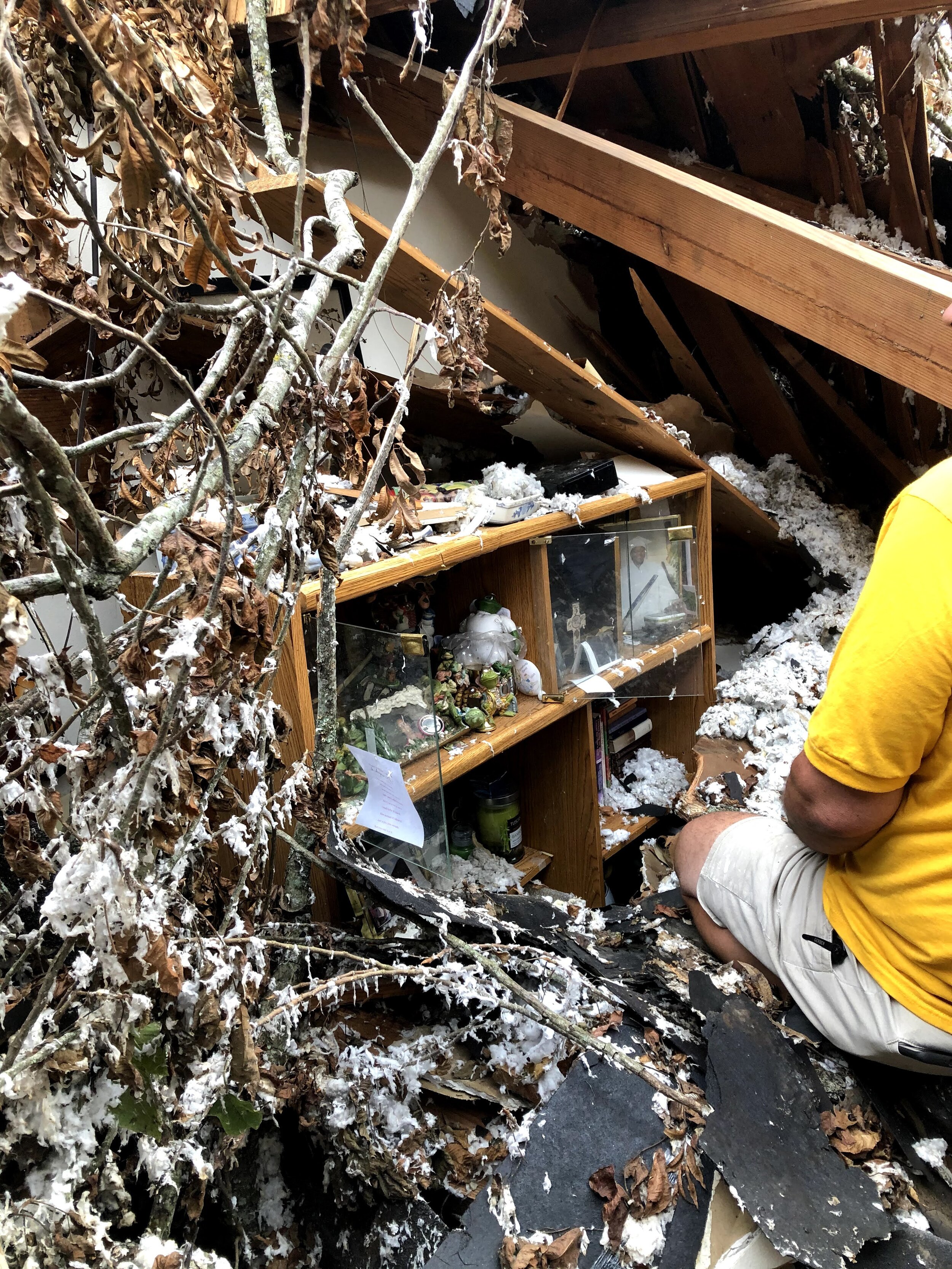 #14 curio cabinet amid debris.jpg